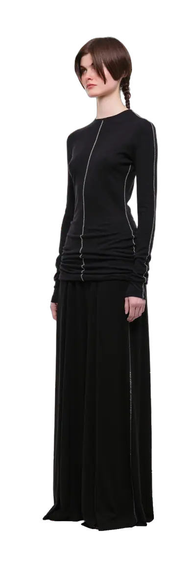 Black long-sleeve top with a crew-neck collar and contrasting decorative beige seam details